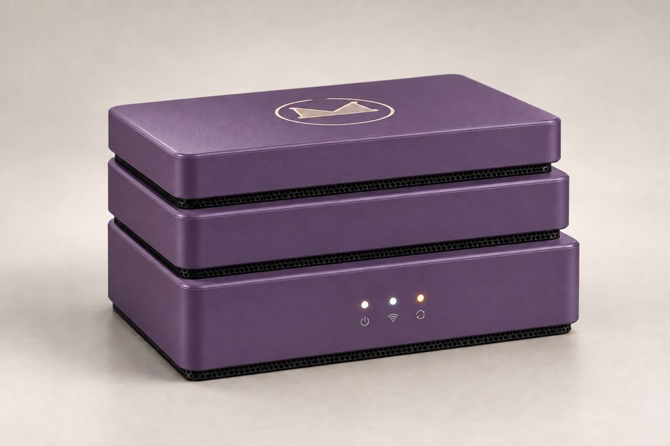 The Stack concept in Dusk Violet, a muted deep purple finish: three rounded rectangular tiers with dark perforated vent bands between them and a vented base. The outlined Synkurl mark sits on top; three small status lights glow on the front.